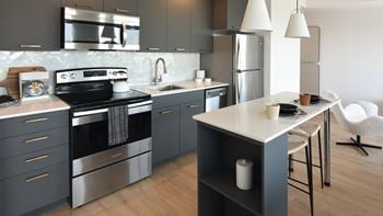 Modern kitchen with stainless steel appliances